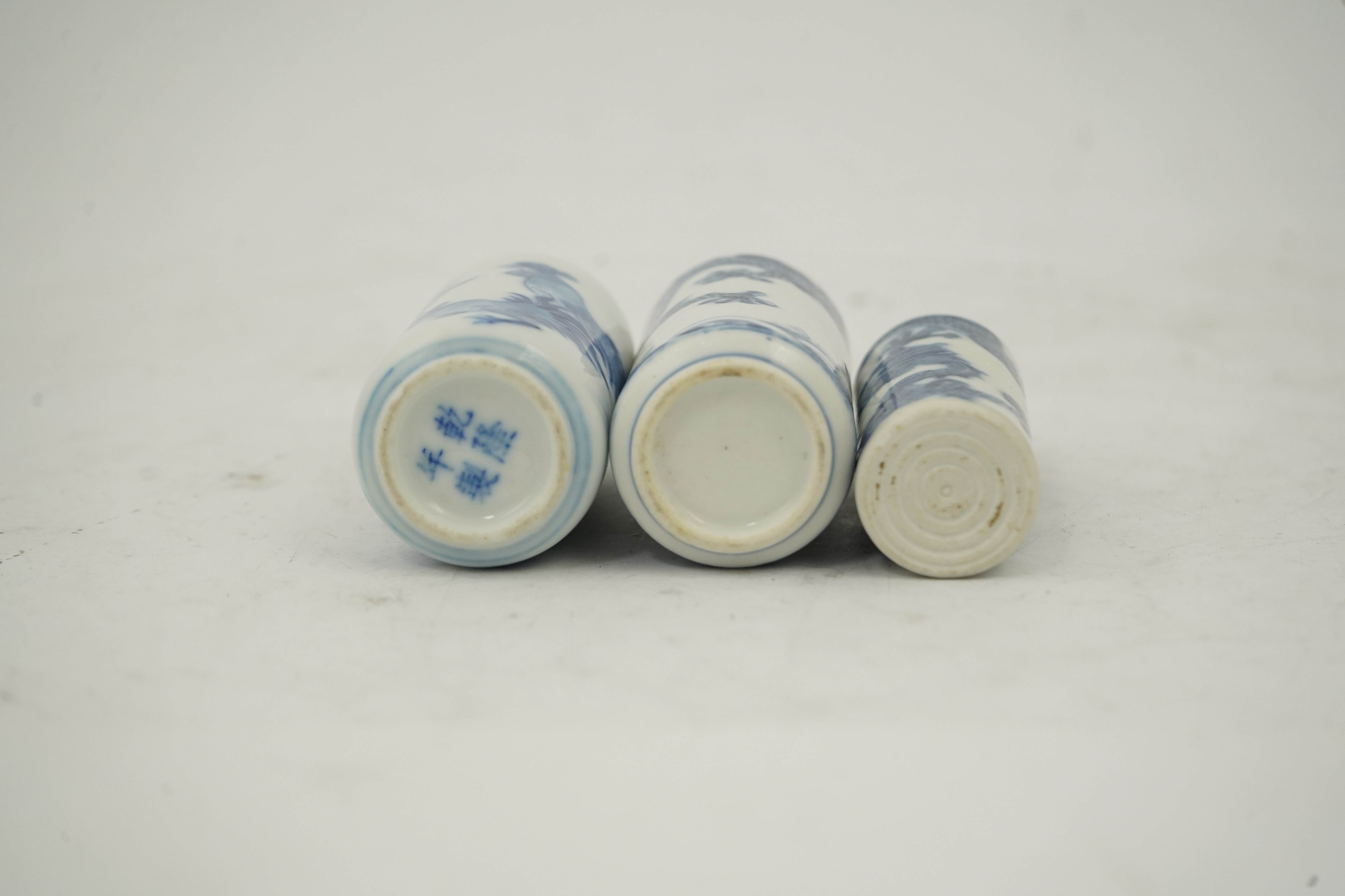 Three Chinese blue and white snuff bottles, c.1850-1900